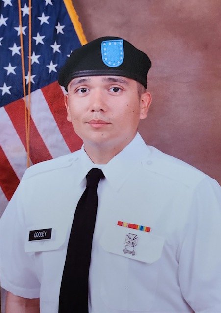 SPC. Tristan E. Cooley